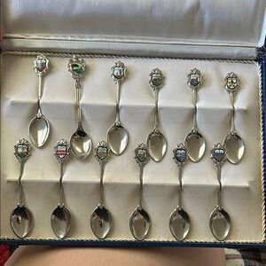 Vintage crest spoons